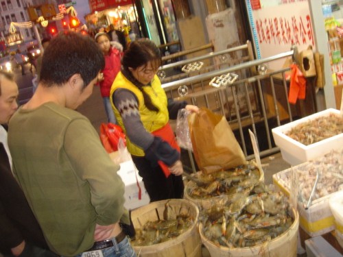 Open-air seafood market in Chinatown. Open-air seafood market in Chinatown.