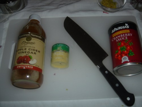 vinegar The cider vinegar, ground ginger and cranberry sauce. That's my beloved Wusthof Santoku knife.